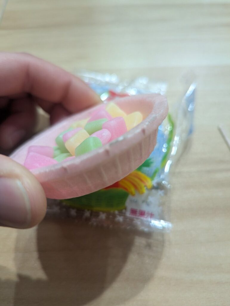 Fruits no Mori monaka wafer bowl held in hand close-up side view