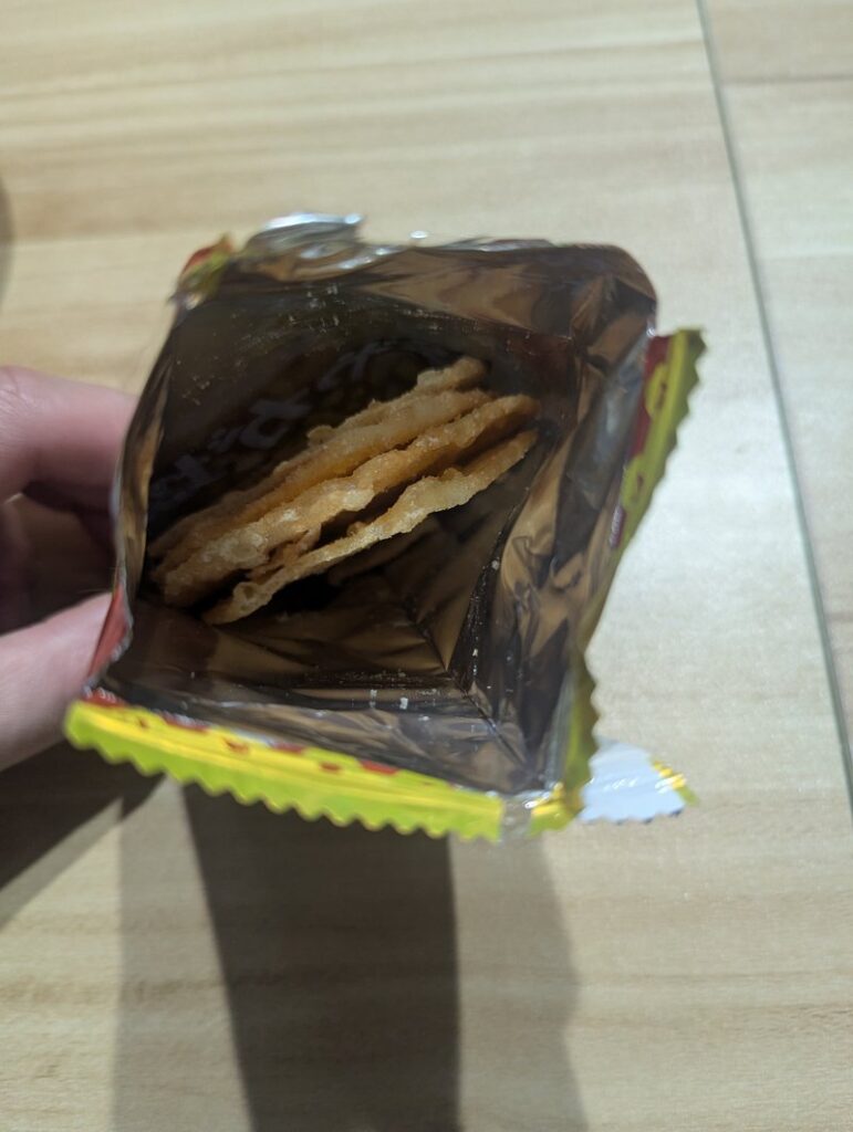 Potato Fry dagashi snack inside open bag four pieces