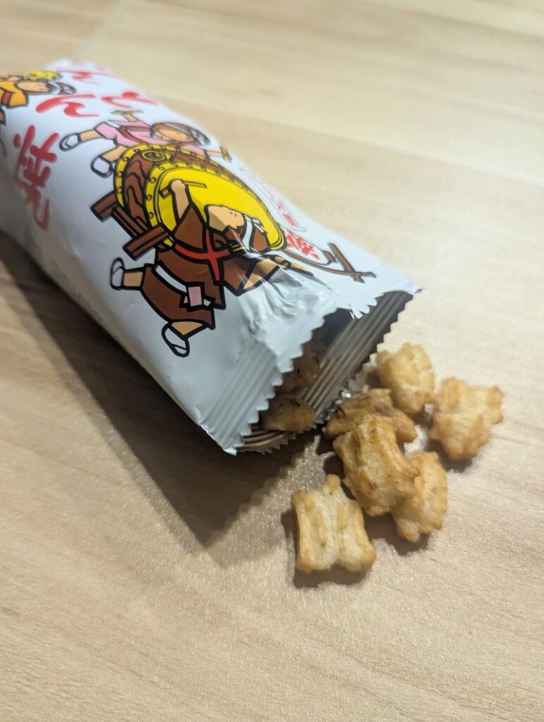 Dondon Yaki snack pieces spilling out of the open bag