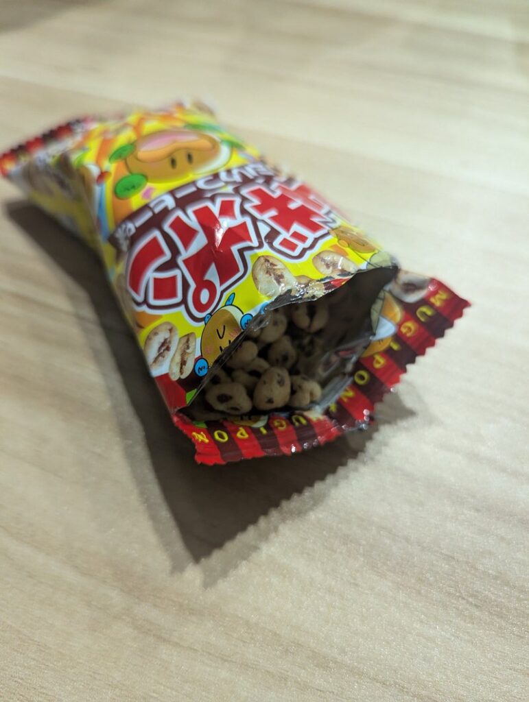 Inside view of open Mugipon bag showing the puffed wheat pieces